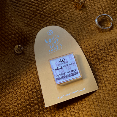 The 4D Ticket Pin