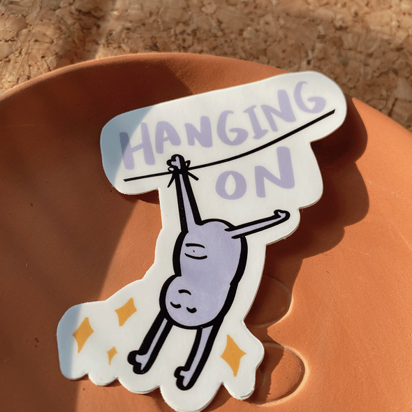 Hanging on sticker