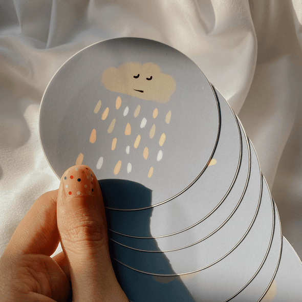 Raining rainbow round sticker - Thewearablethings